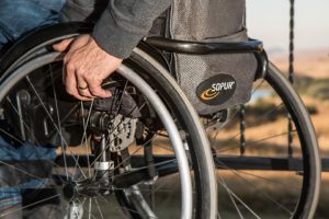 man on wheelchair at healthcare